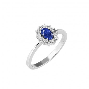 Anello con centrale ovale zaffiro e contorno diamanti