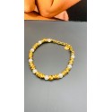 Bracciale rondelle in alluminio dorato e perline