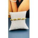 Bracciale rondelle in alluminio dorato e perline