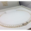 Collana filo di perle freshwater con 2 sfere e susta in oro bianco 