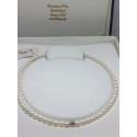 Collana filo di perle freshwater con sfera in oro bianco sfaccettata e susta oro bianco