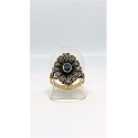 Anello toppa ovale con zaffiro e rosette di diamanti