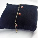 Bracciale oro giallo con charm coccinelle