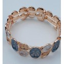 Bracciale armonia elasticizzato in ottone con cerchi alterni perlati