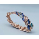 Bracciale armonia elasticizzato in ottone con foglie dai toni azzurri