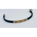 Bracciale caucciù e inserto acciaio dorato e 7 zirconi neri