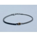 Bracciale acciaio mezzo giro tennis, centrale dorato con strass nero incassato