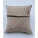 Bracciale acciaio mezzo giro tennis, centrale dorato con strass nero incassato