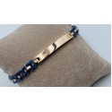 bracciale acciaio rosa e ceramica blu targhetta con strass bianco