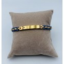 bracciale acciaio dorato e ceramica blu targhetta con strass nero