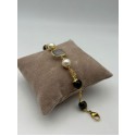 Bracciale in acciaio dorato con perle e pietre dure color grigio-nere