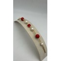 Bracciale in acciaio dorato con perle e pietre dure color rosso