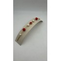 Bracciale in acciaio dorato con perle e pietre dure color rosso