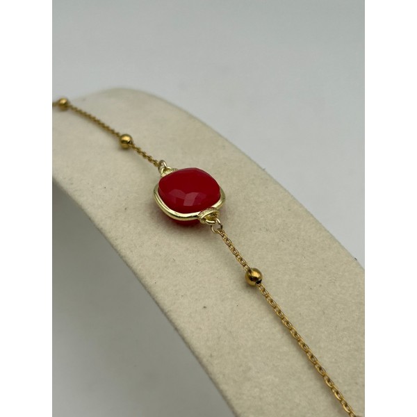 Bracciale in acciaio dorato con pietra dura rossa