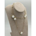 Collana in acciaio dorato con pietre dure bianche