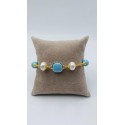 Bracciale in acciaio dorato con perle e pietre dure color turchese