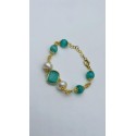 Bracciale in acciaio dorato con perle e pietre dure color verde giada