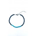 Bracciale in acciaio con ematite e perline color turchese